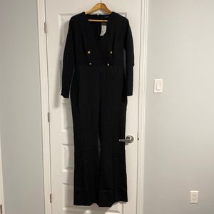 Jumpsuit Regular size 10 Black 3/4 sleeve, v neck plain pattern.